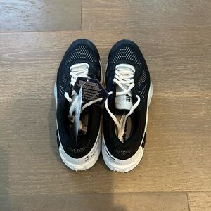 Black and White Wilson Rush pro 4.0 tennis shoes
